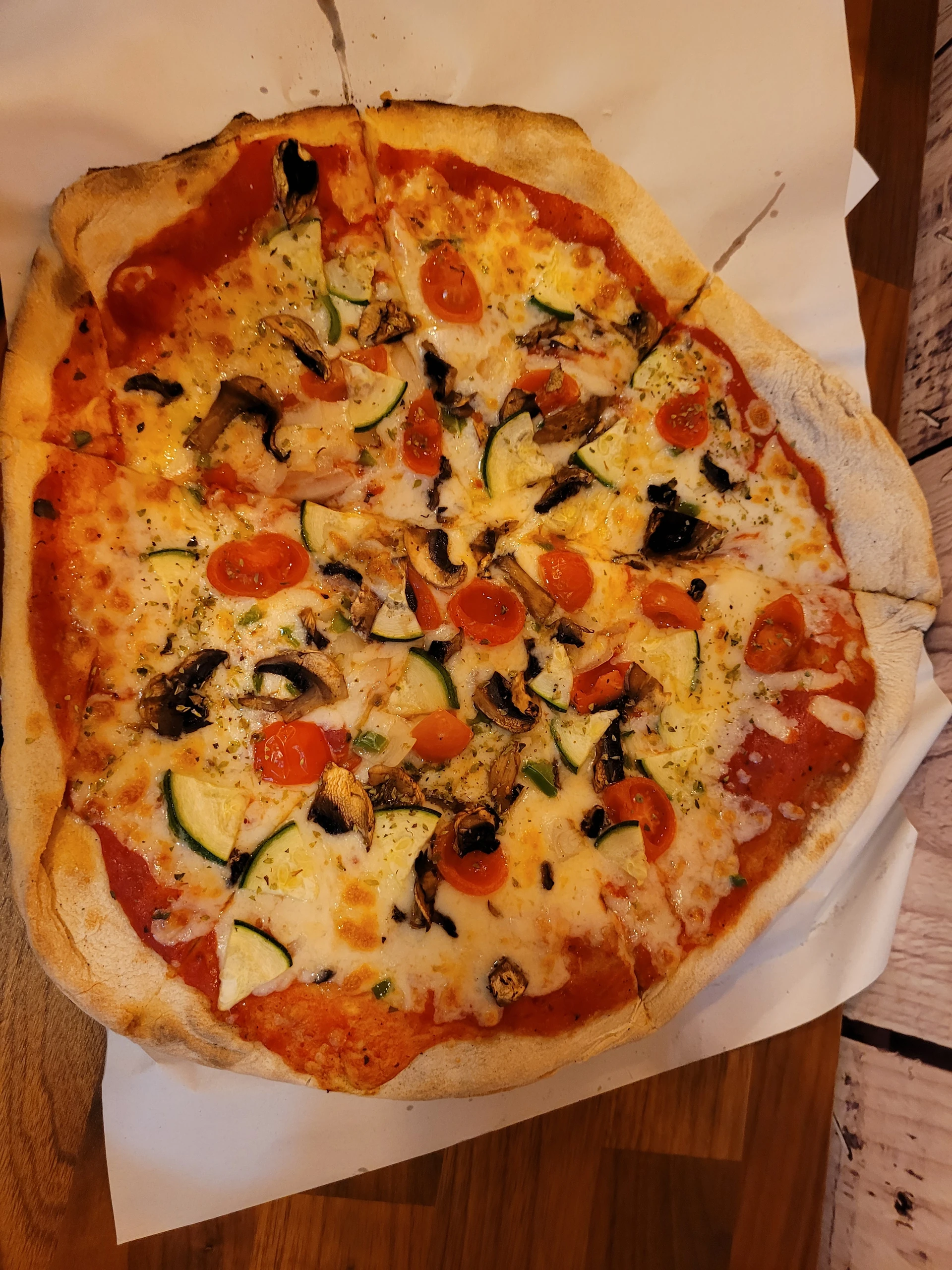 Freshly baked artisanal vegetarian pizza in Seville