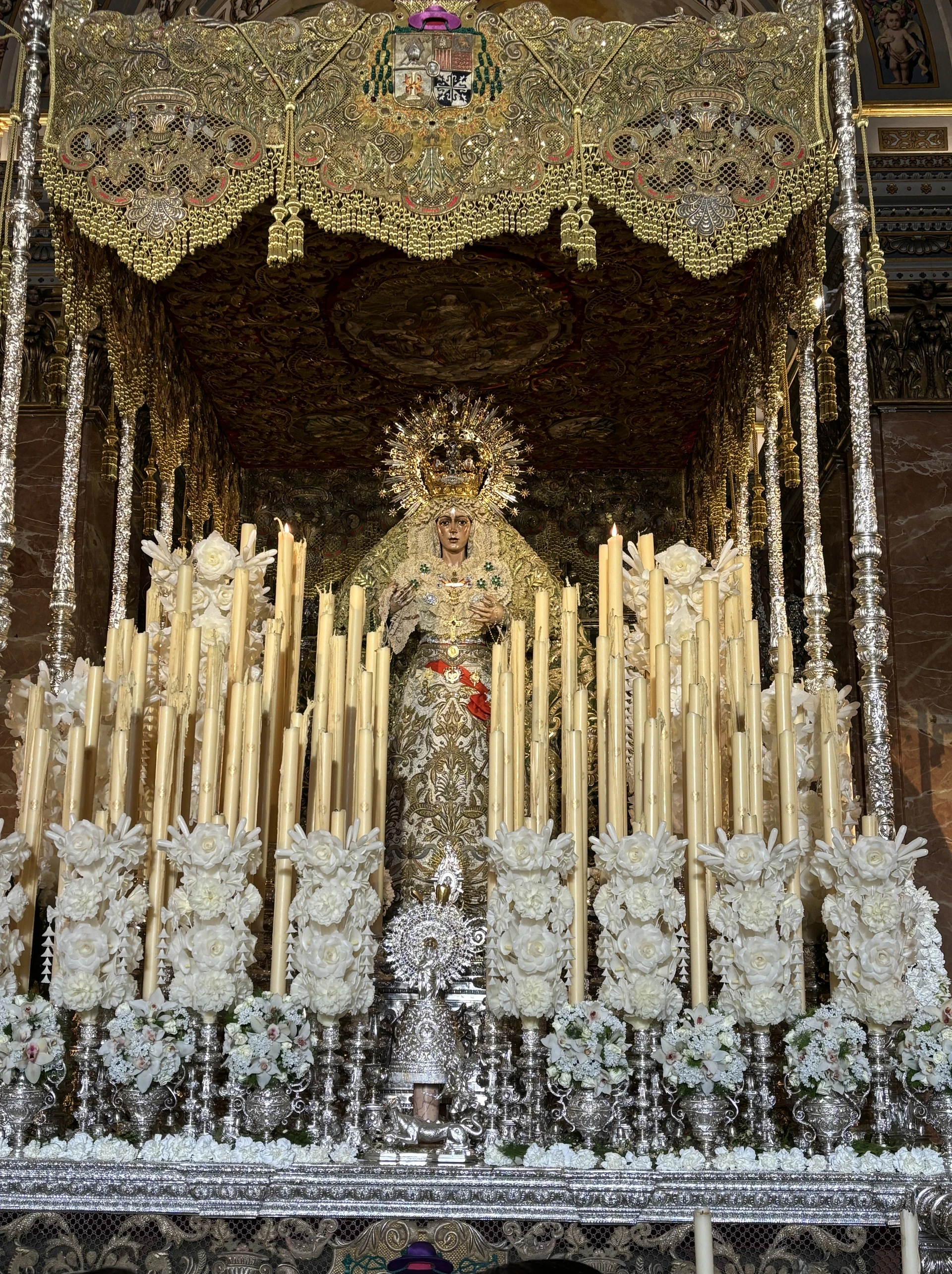 Revered religious imagery inside Macarena Basilica