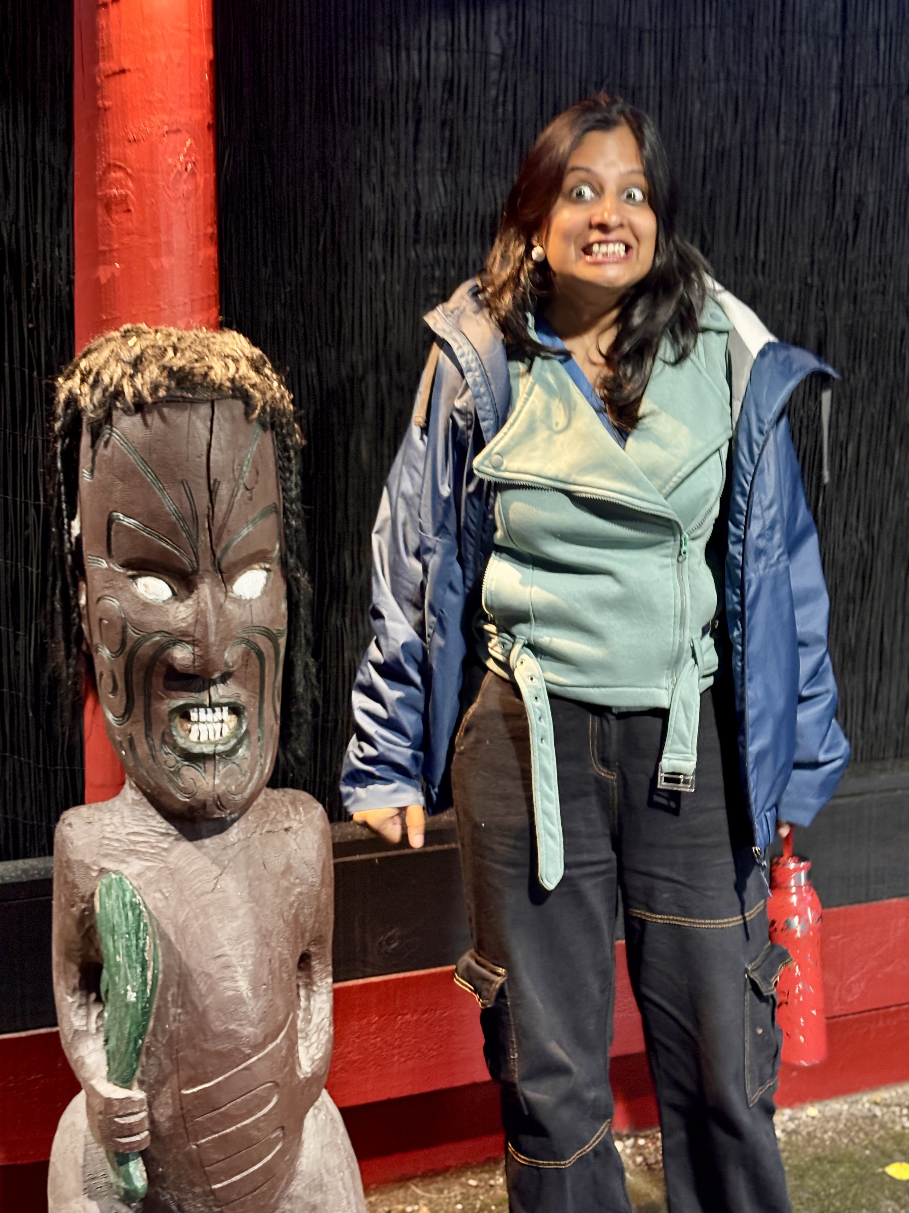 Imitating the traditional expressions of the Maori Haka dance