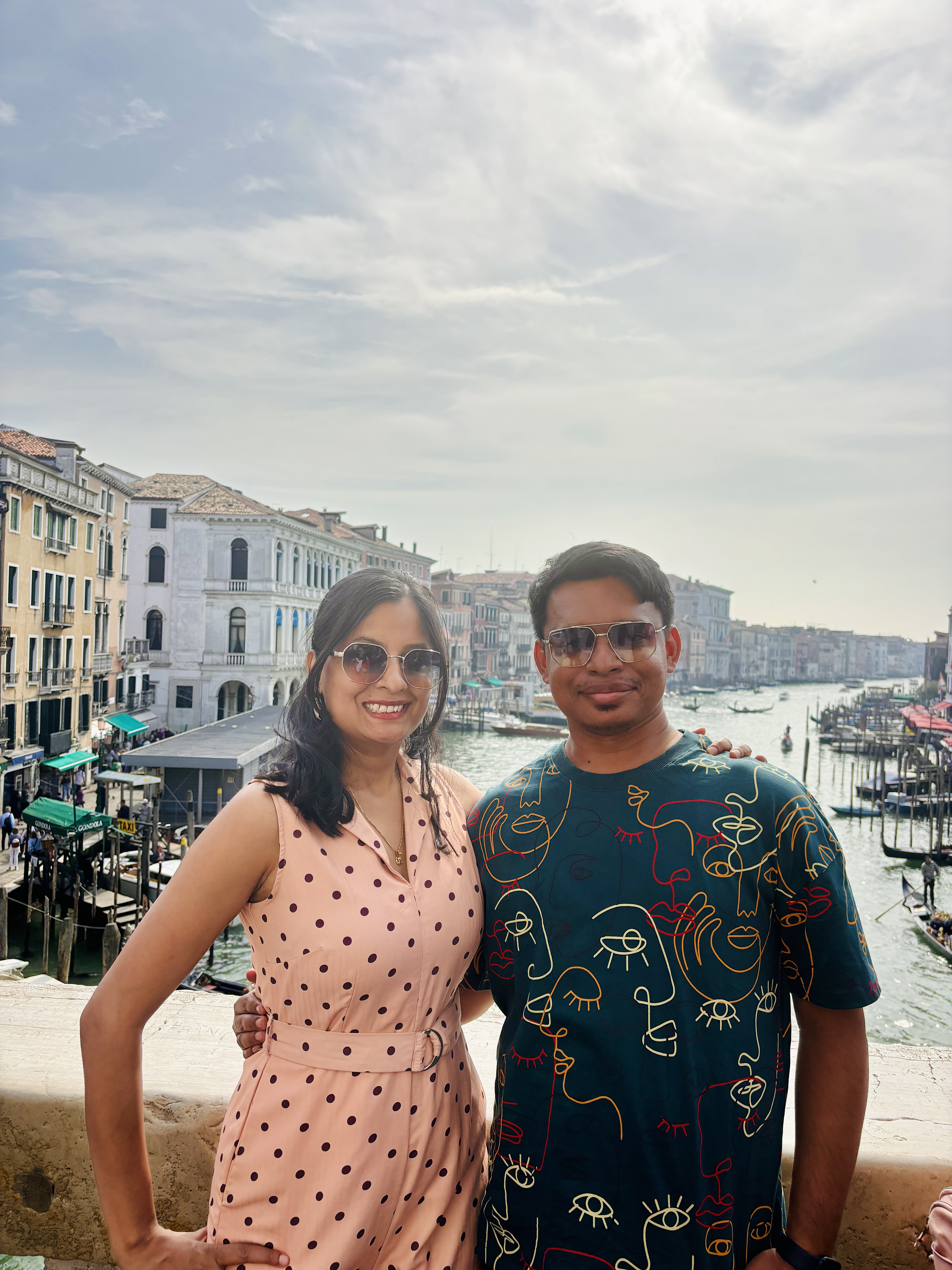 Vibrant view of the Rialto Bridge in Venice with shops on it