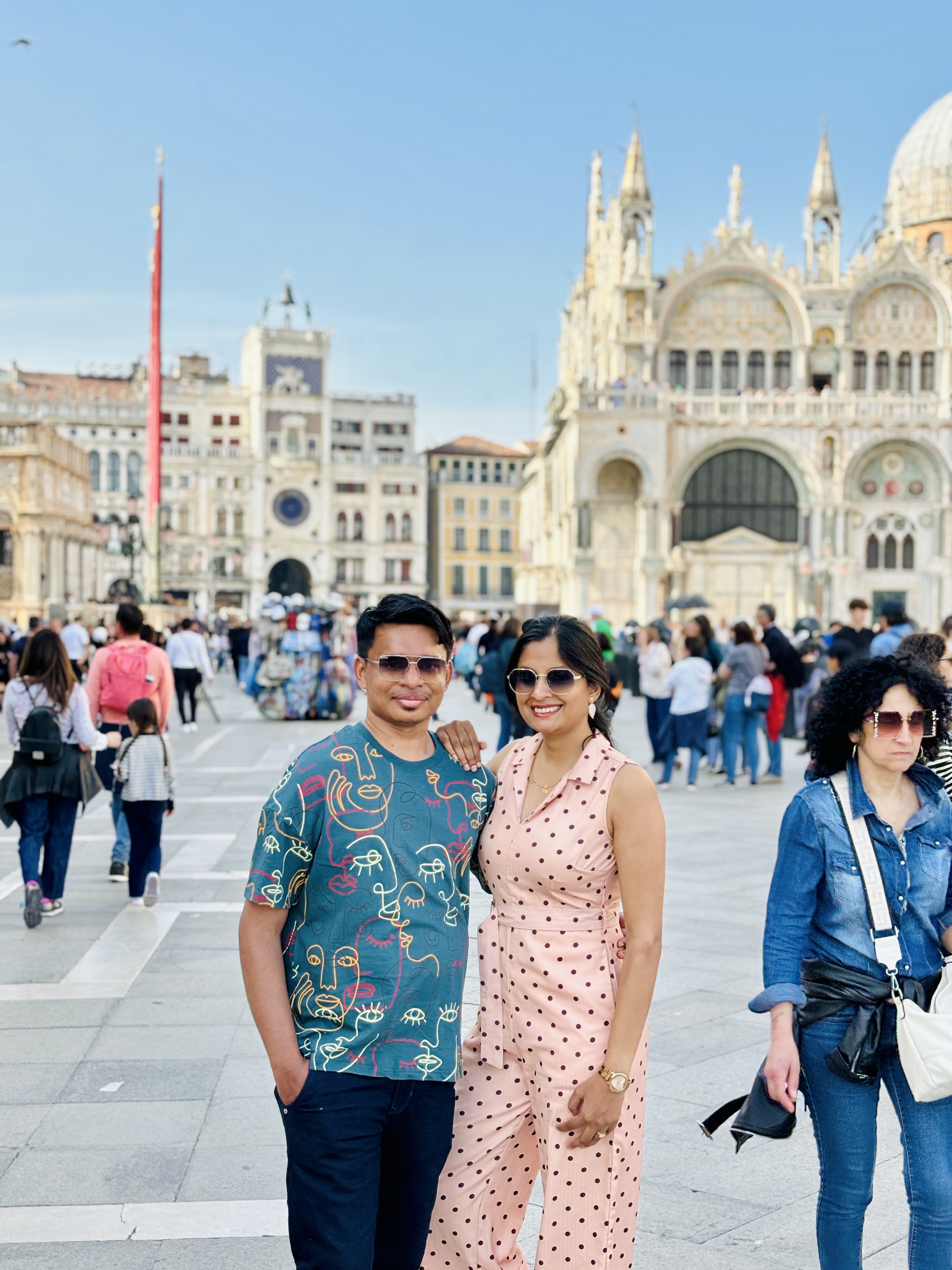 Bustling crowds and landmark architecture at St. Mark's Square in Venice