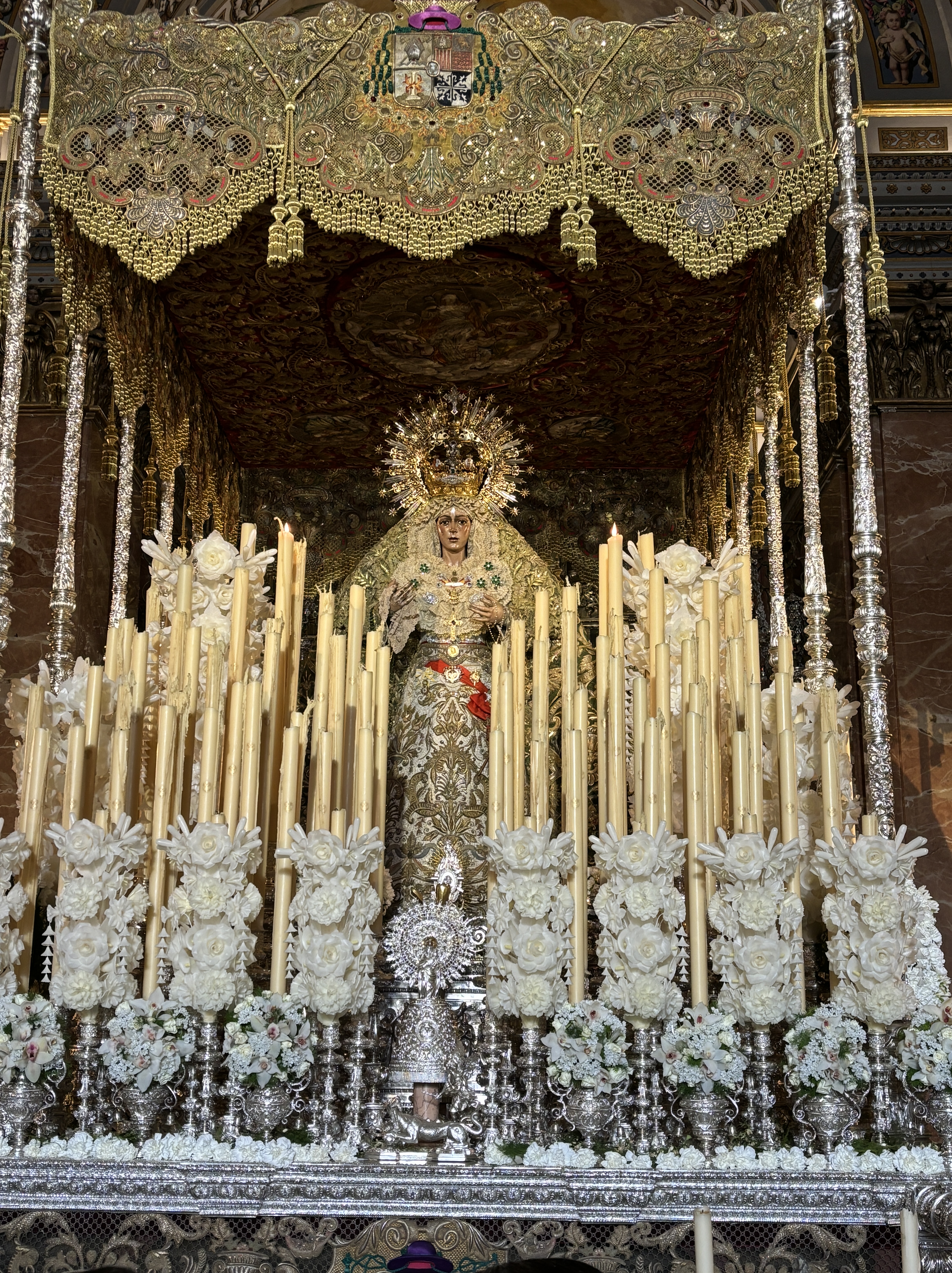 Revered religious imagery inside Macarena Basilica