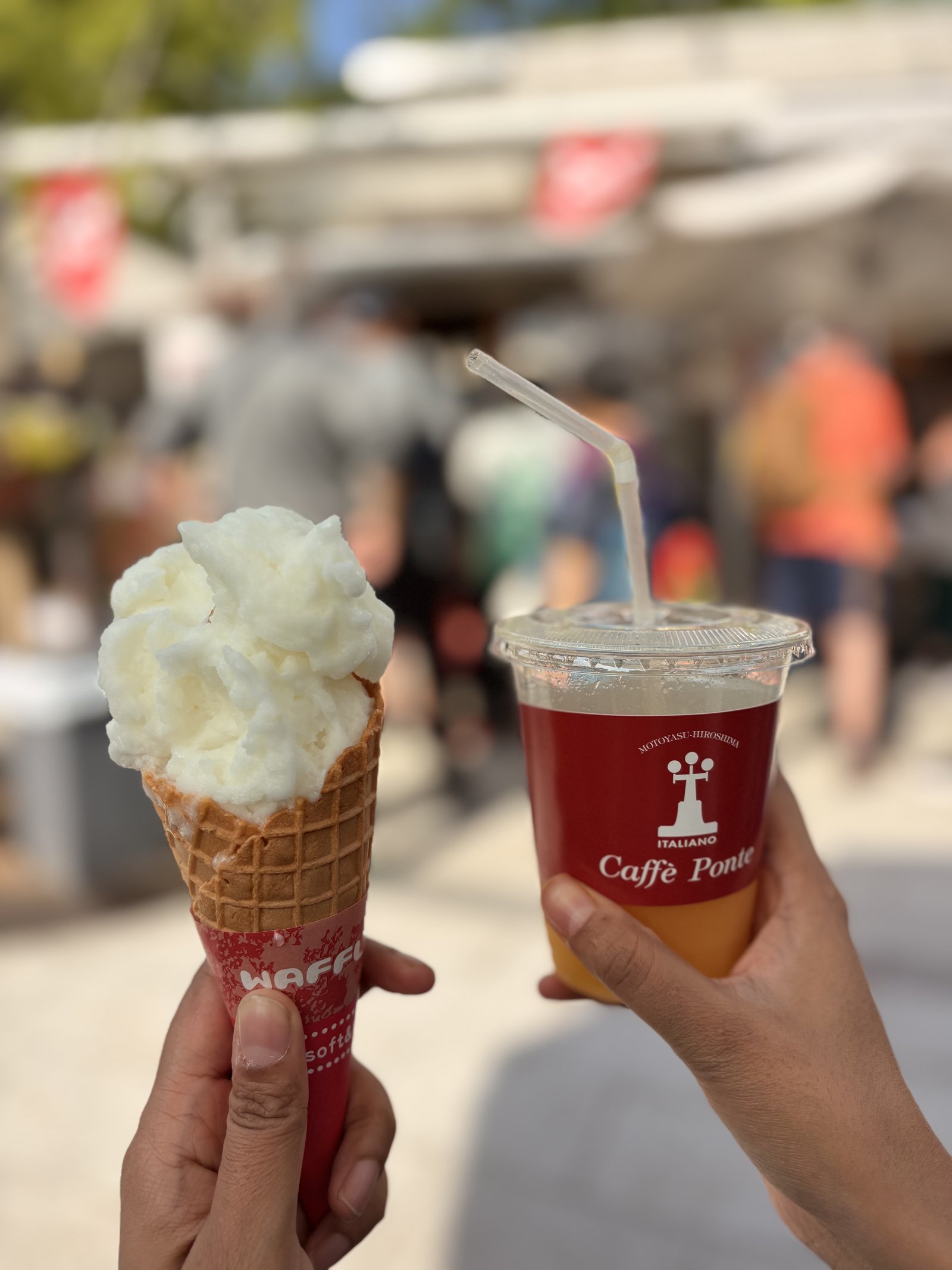 Lemon sorbet cone and a Caffè Ponte cold drink by the Hiroshima riverside